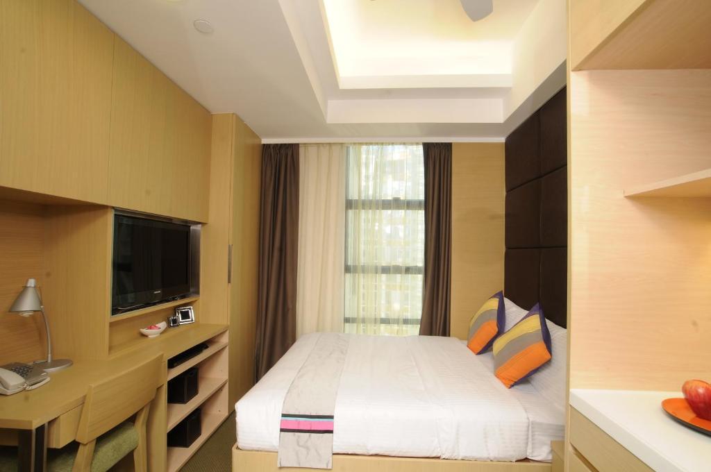 Aparthotel Causeway Corner à Hong Kong Chambre photo