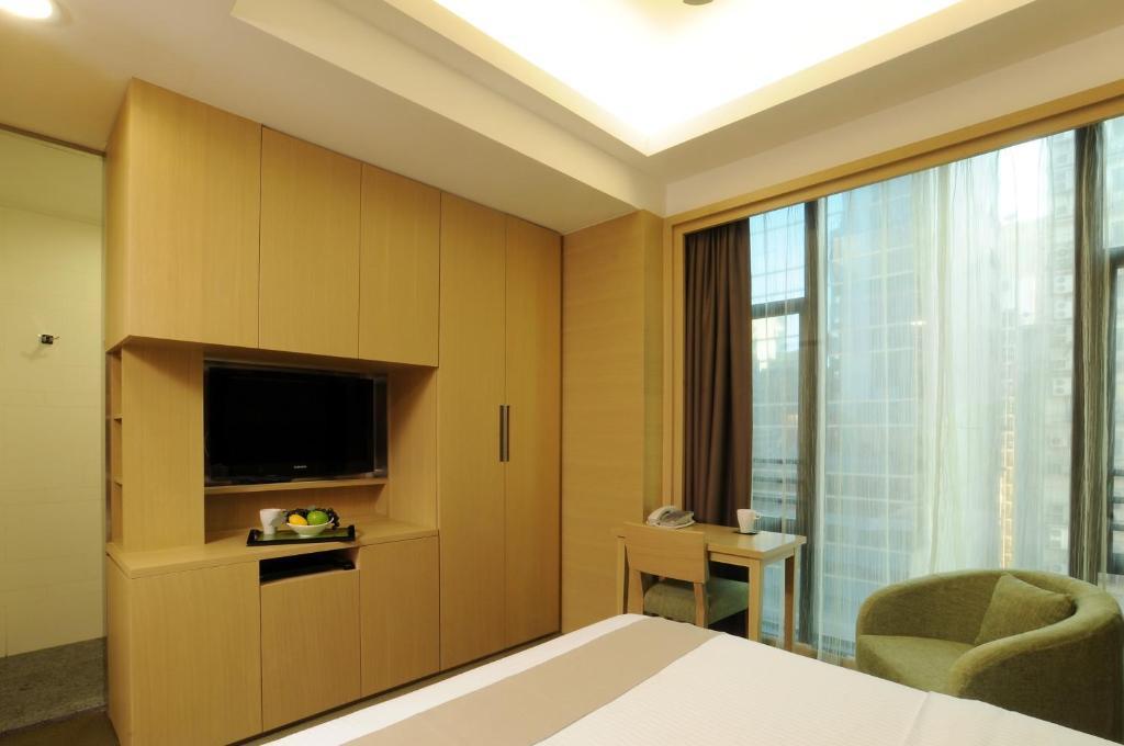 Aparthotel Causeway Corner à Hong Kong Chambre photo